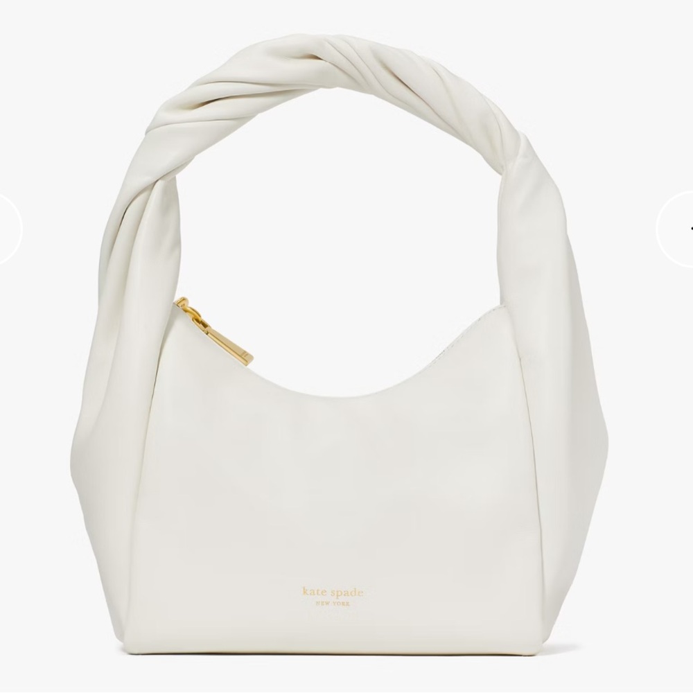 Kate Spade New York Twirl top-handle bag in nappa leather and white.